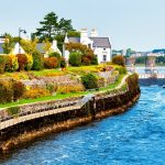 Beautiful landscape of Galway, Ireland. River and houses with clear blue sky