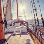 Old sailing ship at sunset.